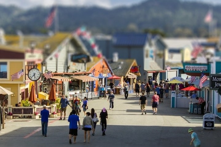 a group of people walking down the street